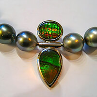 Wechselschließe aus Silber mit opalisierten Fossilien